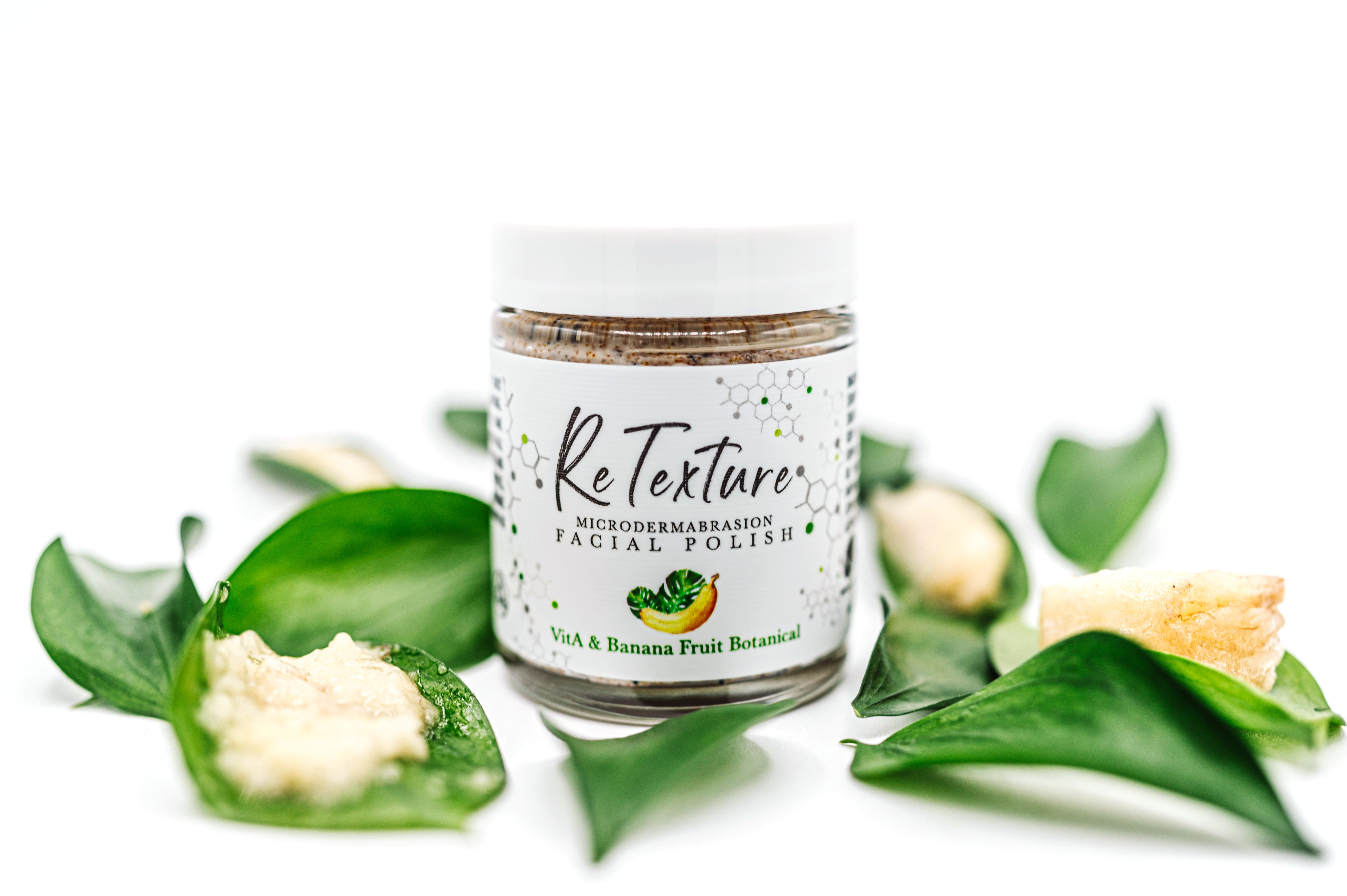 "ReTexture" Banana & Vit A - MicroDermabrasion Facial Polish and Botanical Facial Treatment (Vegan - 2oz Glass Jar) - Membrane Post Care Products Inc. "ReTexture" Banana & Vit A - MicroDermabrasion Facial Polish and Botanical Facial Treatment (Vegan - 2oz Glass Jar) - Membrane Post Care Products Inc.